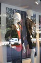 Mannequins in summer clothes in the shop window