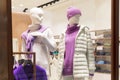 Mannequins in winter clothes in a shop window. Fashion and style, new collection Royalty Free Stock Photo