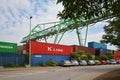 Big industrial container terminal and crates at inland port at Neckar river called `Salzkai` in Man