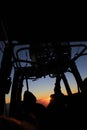 Manoeuvre hot air balloon burner in morning sun rise