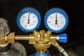 Manometer or pressure gauge with valve and gas cylinder reducer Royalty Free Stock Photo