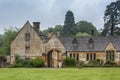 Manor House built in Jacobean period architecture 1630 in guiting yellow stone, in the Cotswold village of Stanway Gloucestershire Royalty Free Stock Photo