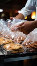 Mans close up action securing cookies inside a plastic bag during grocery shopping