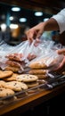 Mans close up action securing cookies inside a plastic bag during grocery shopping