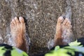 Mans feet .Standing on beach barefoot. Covered with water Royalty Free Stock Photo