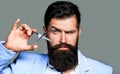 Mans haircut in barber shop. Barber scissors, barber shop. Brutal man, moustache. Male in barbershop, haircut, shaving Royalty Free Stock Photo