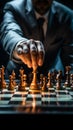 A mans hand, focused on chess, illustrates business planning and metaphorical comparison