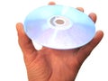 Mans hand holding compact disc on the finger isolated Royalty Free Stock Photo