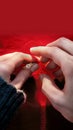 Mans hand placing engagement ring on womans finger, close up Royalty Free Stock Photo