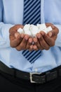 Mans hands cupped with sugar cubes Royalty Free Stock Photo