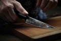 Mans hands sharpening knife on wooden cutting board. Selective focus. knife sharpening, Ai Generated