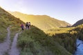 Mans hiking at sunset mountains with heavy backpack Travel Lifestyle wanderlust adventure concept summer vacations outdoor alone i Royalty Free Stock Photo