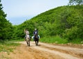 Boys on horseback riding Royalty Free Stock Photo