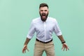 Mans roar! The angry businessman, screaming with closed eyes. Indoor, studio shot. Royalty Free Stock Photo