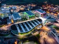 Mansfield Sutton in Ashfield Modern NHS Kings Mill hospital building lit up bright colourful night exterior aerial view drone