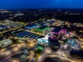 Mansfield Sutton in Ashfield Modern NHS Kings Mill hospital building lit up bright colourful night exterior aerial view drone Royalty Free Stock Photo