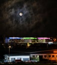 Mansfield town uk city skyline under full moon night sky industrial buildings houses and modern hospital panoramic high view