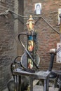 A small Christian shrine with machinery in Manshiyat Naser, Garbage City, Cairo