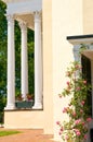 Mansion porch and roses Royalty Free Stock Photo