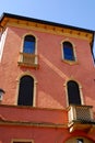 A mansion with a red side and narrow near the Basilica of St. Anthony in Padua in the Veneto (Italy) Royalty Free Stock Photo