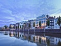 Mansions mirrored in a harbor at twilight, Breda, Netherlands