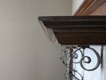 Mantel over a painted brick fireplace in an old home