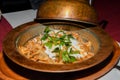 Manti is an extraordinary dish from Turkey: tiny lamb-stuffed dumplings topped with three sauces