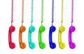 Manu colorful vintage phones hanging of a cable Royalty Free Stock Photo