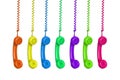 Manu colorful vintage phones hanging of a cable Royalty Free Stock Photo