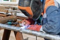 Manual arc welding of stainless steel pipe Royalty Free Stock Photo