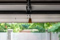 Manual cable operated garage shutter door opener inside to out view point