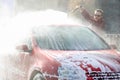 Manual car wash with pressurized water in car wash outside.Summe Washing. Cleaning Car Using High Pressure Water. Royalty Free Stock Photo