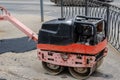 Manual compact asphalt roller