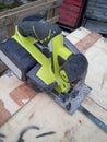 Manual cordless circular saw in sawdust Royalty Free Stock Photo