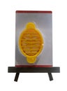 Manual egg slicer with yellow plastic slotted dish