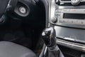 Manual gearbox transmission handle in the car close up Royalty Free Stock Photo