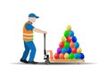 Manual hydraulic pallet truck with multi-colored Easter eggs, the worker moves the load. Happy easter Royalty Free Stock Photo