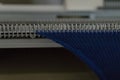 Manual knitting machine. A knitting machine is a device used to create knitted fabrics