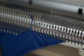 Manual knitting machine. A knitting machine is a device used to create knitted fabrics