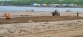 Cleaning the filthy beach of Versova in tropical Mumbai Royalty Free Stock Photo