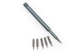 Metal mini screwdriver with interchangeable bits different sizes close-up