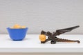 manual nut cracker for walnuts lies on the table. Royalty Free Stock Photo