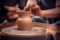 Hands of potter do a clay pot Royalty Free Stock Photo