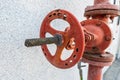 Manual red hand wheel valve of a fire prevention system Royalty Free Stock Photo