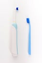 Manual Regular Toothbrush Against Modern Electric Toothbrush