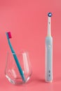 Manual Regular Toothbrush Against Modern Electric Toothbrush