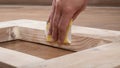 manual sanding of wooden doors with sandpaper