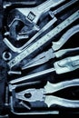 Manual tools and screws with a metallic blue color Royalty Free Stock Photo