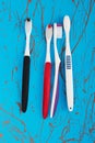 Manual toothbrush set on blue background Royalty Free Stock Photo