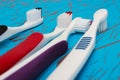 Manual toothbrush set isolated on blue background Royalty Free Stock Photo